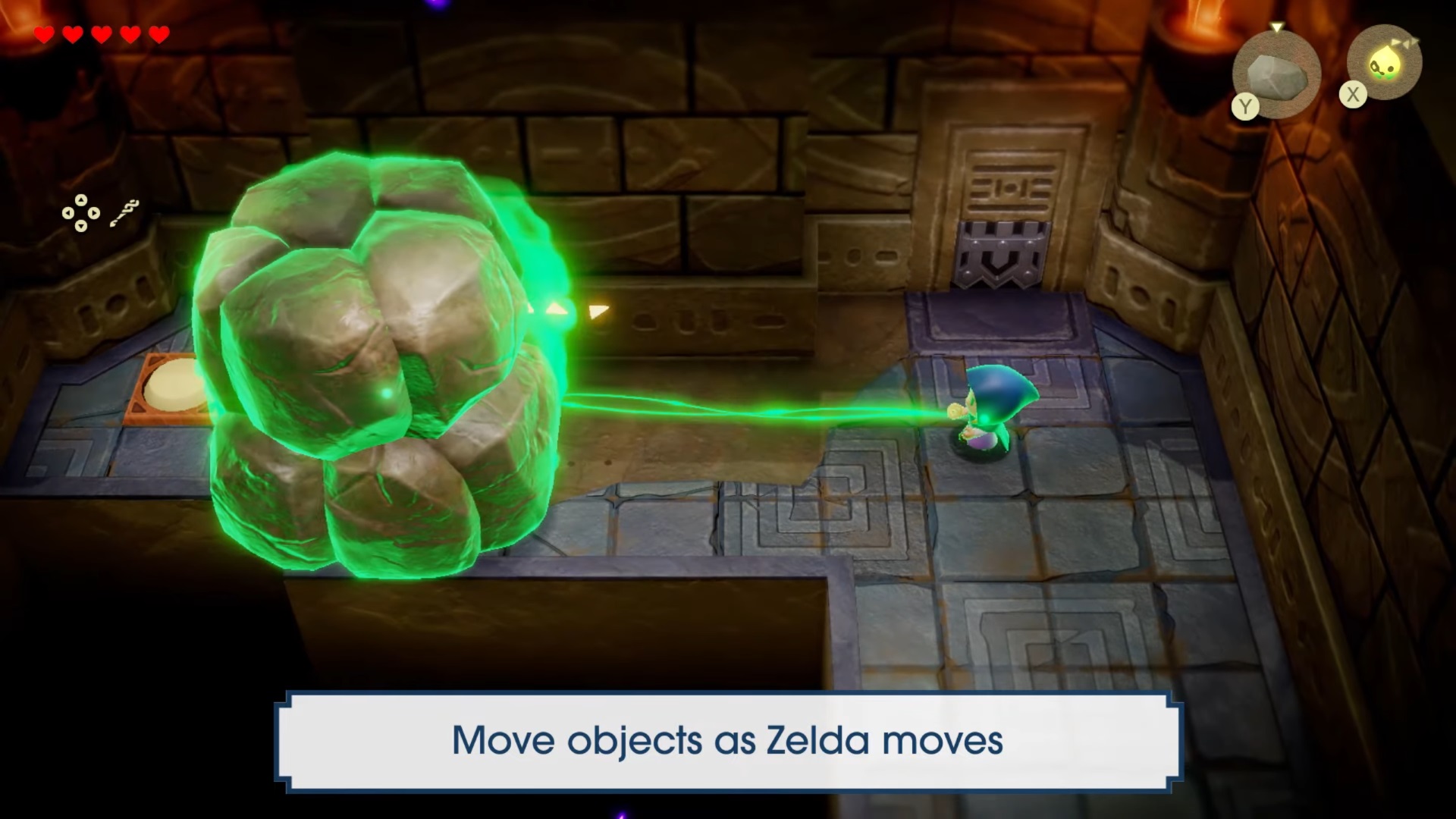 Zelda using Bind to move a large boulder out of the way