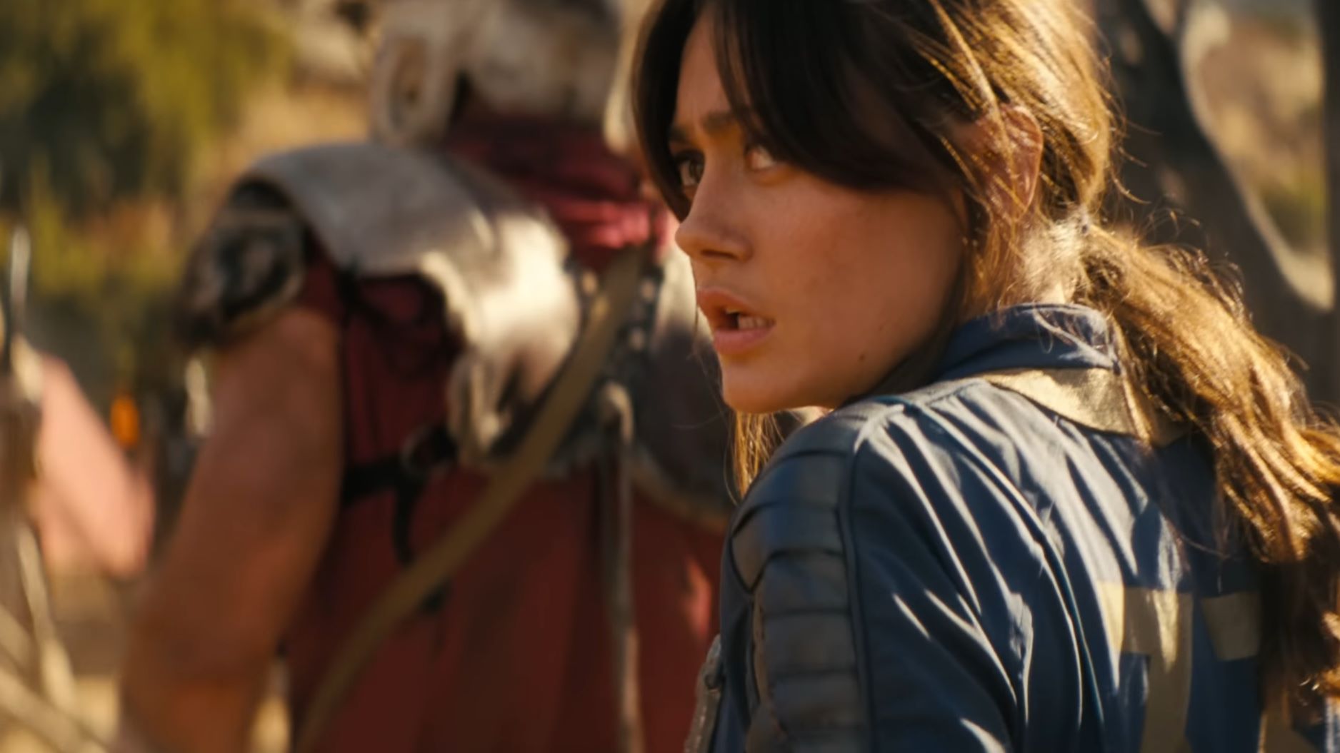 Lucy being detained by Caesar's Legion.