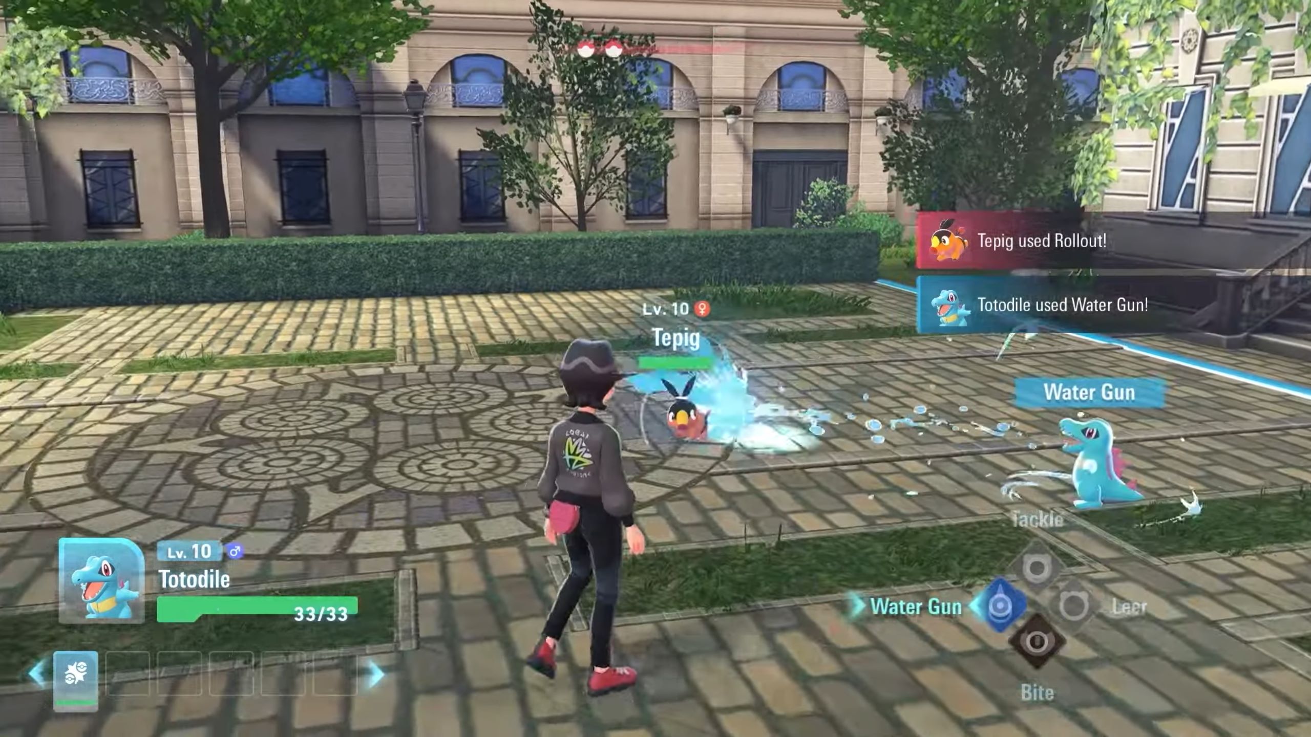 Totodile attacks Tepig with a super-effective move. Water Gun is a long-range move in Pokémon Legends: Z-A